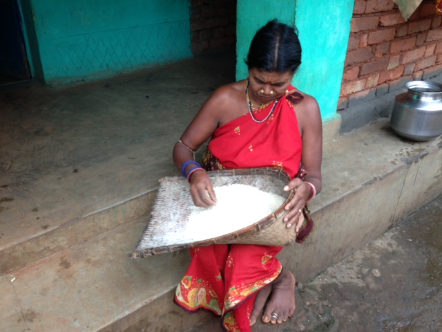 women cleaning rice