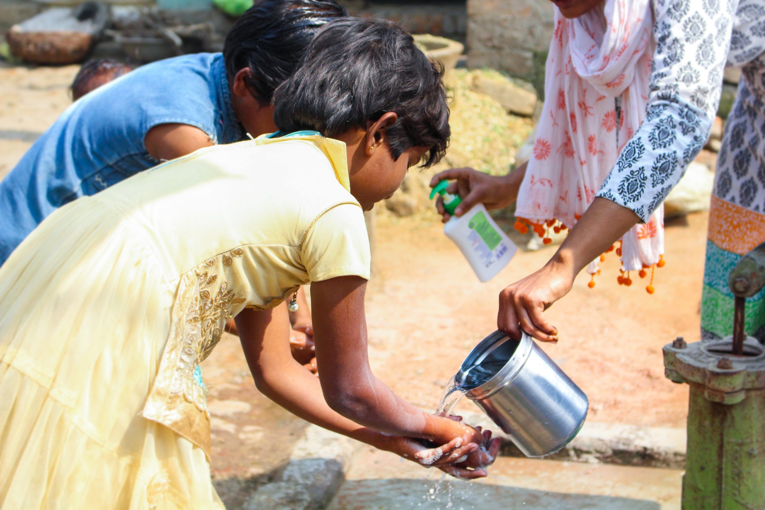 Girl washing her hands