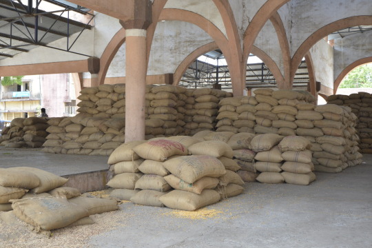 stacks of burlap food bags
