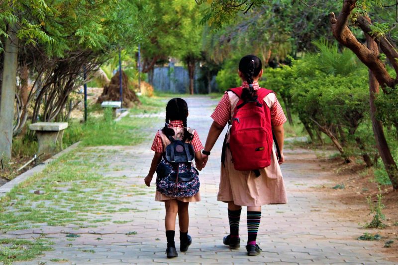 Two children walking