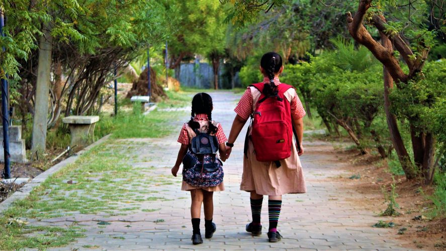Two children walking