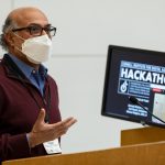 Prabhu Pingali speaking at a podium