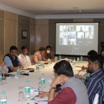 Agriculture experts sitting around a table