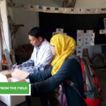 Soumya Gupta and a staffer handle medical equipment
