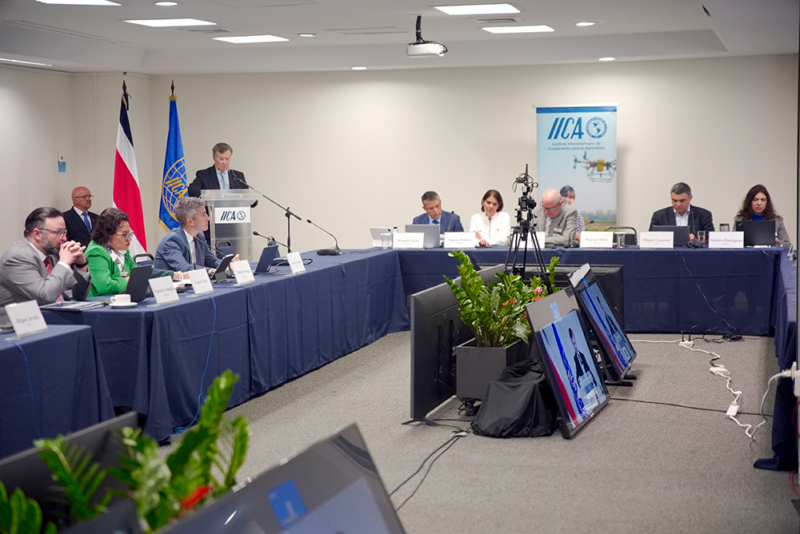 Men and women sitting at tables during the OPSAa workshop